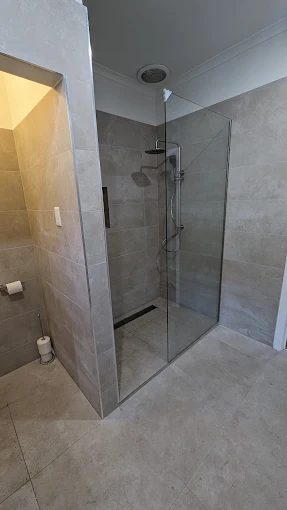 Melbourne Home Makeover frameless shower fit-out with tiled walls